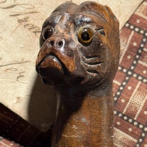 antique Victorian pug dog wooden page turner with glass eyes