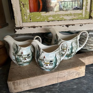 A set of three Dream Town by Johnson Brothers England jugs