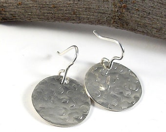 Tiny sterling silver hammered earrings. Flat round textured earrings for her. Small circle earring