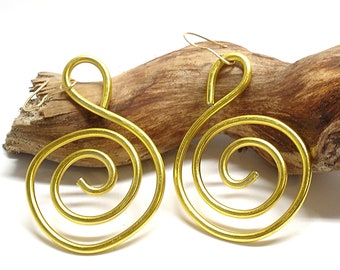 May include: A pair of gold-colored spiral earrings. The earrings are made of wire and have a simple, elegant design.
