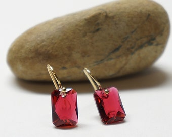 Tiny crystal earrings. Small gold filled drop earrings with red emerald cut crystal. Small gold dangle earrings for women