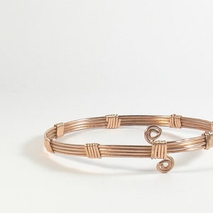 Copper wire wrapped bracelet. Spiral copper bangle bracelet for woman. Metal cuff bracelet. Gift for wife