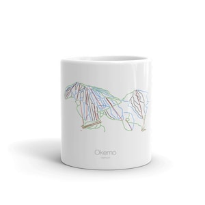 May include: White ceramic mug with a green, blue, and red ski trail map of Okemo, Vermont.