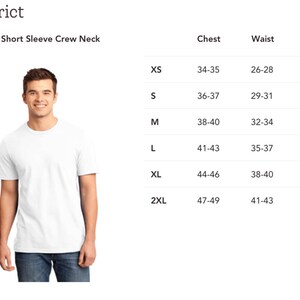 May include: A white short-sleeved crew neck t-shirt with the text "DT6000" and "Short Sleeve Crew Neck" printed on the front. A size chart is shown with chest and waist measurements in inches for sizes XS, S, M, L, XL, and 2XL.