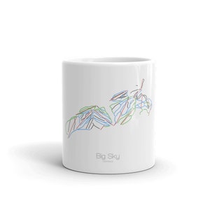 May include: White ceramic mug with a black outline of the Big Sky ski resort trail map in Montana. The text "Big Sky" and "Montana" are printed in gray below the map.