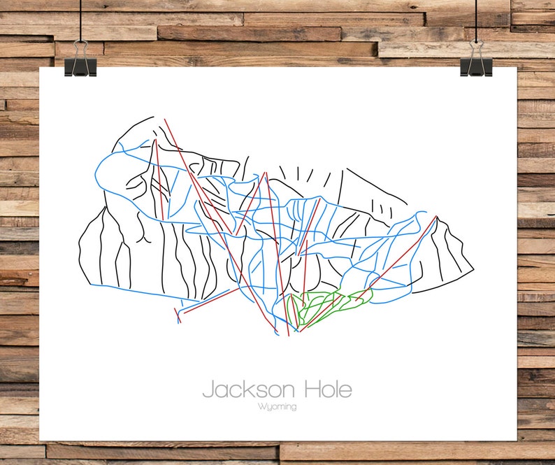 May include: A black and white line art map of the Jackson Hole ski resort in Wyoming. The map shows the different ski runs, with blue lines for easy runs, red lines for intermediate runs, and green lines for difficult runs.