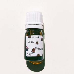 Menhit. natural perfume. California figs, orange blossom + sandalwood. From handmade absolutes, enfleurage + tinctures. April 2023