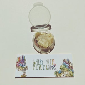 Citrine. natural perfume. ethereal floralcy. orange blossom honey, dark honey crystals, august fields & fresh grass. botanical. Dec. 2022