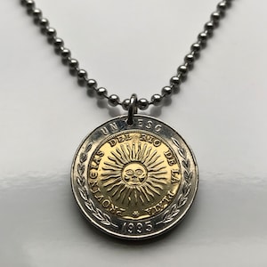 2009 Argentina 1 Peso coin pendant Sol de Mayo Buenos Aires Córdoba Rosario Mendoza San Miguel de Tucumán La Plata Salta Lanús asado n000481