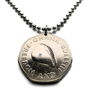 May include: A set of three ceramic mugs with a speckled, matte finish. The mugs are in shades of cream, light gray, and dark gray. Each mug has a simple, modern design and a rounded handle.