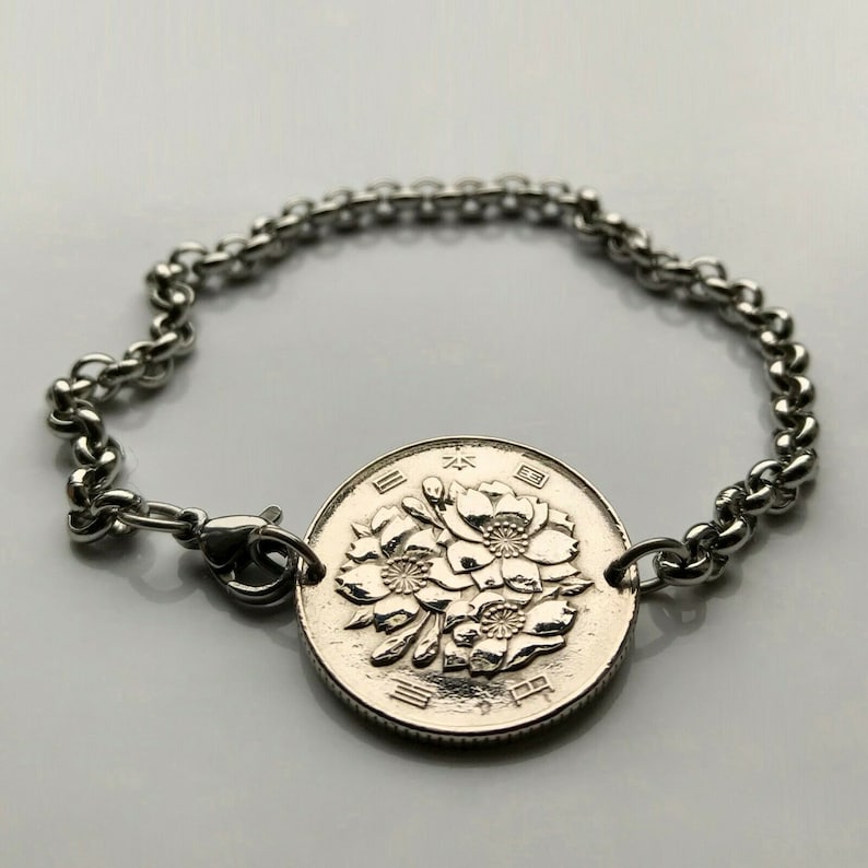 1981 Japan 100 Yen coin bracelet sakura cherry blossom Tokyo Osaka Kyoto Okinawa Sendai Chiba Niigata Nippon floral bouquet b000047