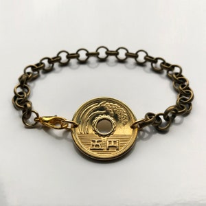 1964 Japan Nippon 5 Yen coin bracelet rice stalk Tokyo Yokohama Sapporo Kyoto Kobe Sendai Saitima Osaka Chiba Okinawa Sakai Niigata b000028