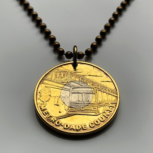 Miami Florida Metro Dade Transit MDT token coin pendant initial M Metrorail Metrobus Metromover train bus railroad transportation n001415