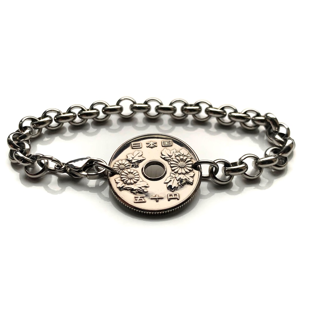 Braccialetto con moneta da 50 Yen, Giappone, 1969, fiore di
