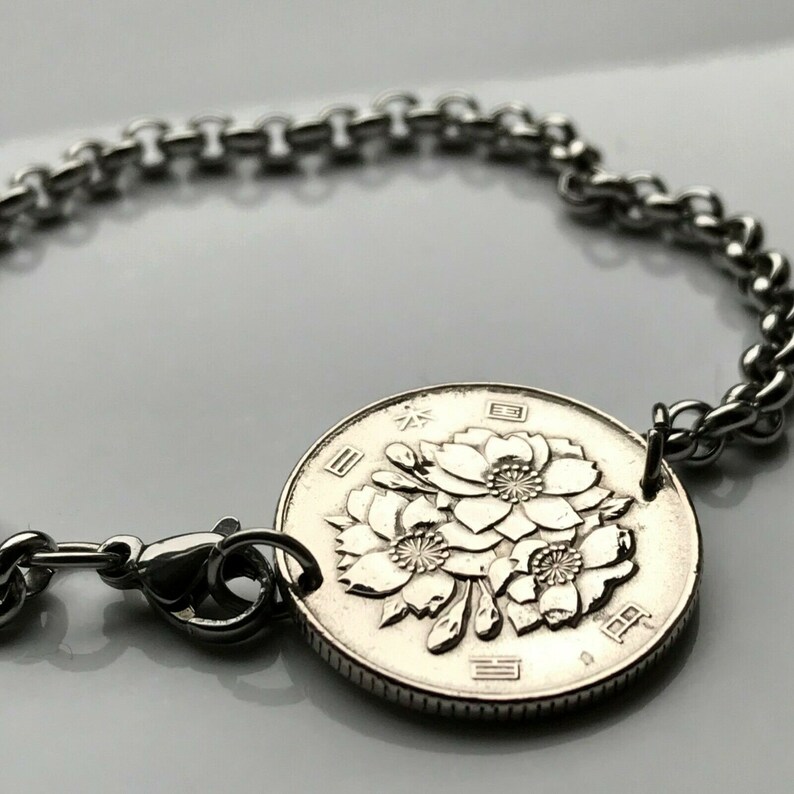 1981 Japan 100 Yen coin bracelet sakura cherry blossom Tokyo Osaka Kyoto Okinawa Sendai Chiba Niigata Nippon floral bouquet b000047