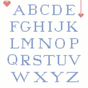 May include: Blue cross-stitch alphabet with a row of red hearts and blue and red circles at the bottom.