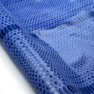 May include: Close-up of a sheet of blue snakeskin leather. The leather has a scale pattern and is folded over, revealing a lighter blue underside. The texture is detailed and the colour is vibrant.