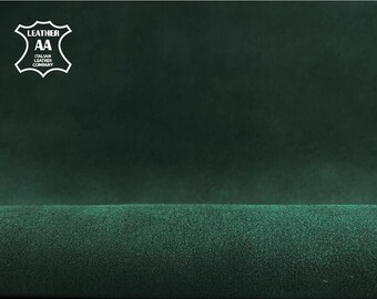 May include: Dark green leather material with a soft, velvety texture. The image features a close-up view of the fabric, highlighting its rich color and subtle sheen. A white logo with the text "LEATHER AA ITALIAN LEATHER COMPANY" is in the upper left corner.