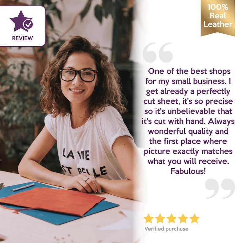 May include: A woman wearing glasses and a white t-shirt with the text "LA VIE ST BELLE" smiles at the camera. The image includes a review badge, a "100% Real Leather" seal, and a customer quote.