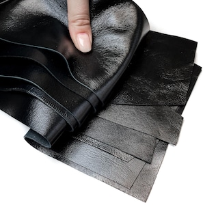Paquete de retazos de cuero negro (80 g - 900 g, 2,4 - 63 oz), muestras de cuero precortadas de todos los tamaños, pendientes de tela negra, accesorios pequeños.