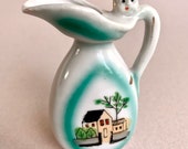 Rare Find Vintage Miniature Ceramic Vase With Baby Face And Painted House Made in Japan collectible