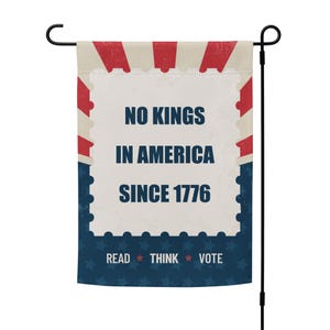 May include: A red, white, and blue garden flag with the text "NO KINGS IN AMERICA SINCE 1776" and "READ THINK VOTE" at the bottom.