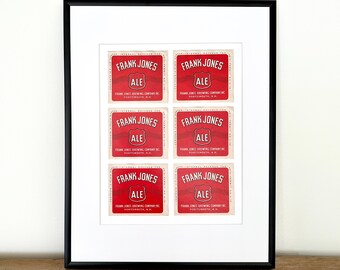 May include: A framed print of six vintage beer labels for Frank Jones Ale. The labels are red with white lettering and feature a shield with the word "ALE" inside.