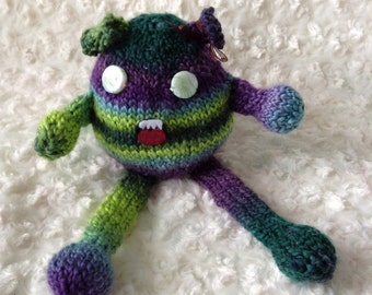 Blue the Monster Knitted with Purple, Green, and Blue Yarn