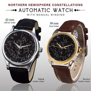 May include: Two automatic watches with manual winding. One has a 42 mm silver tone case and black leather straps. The other has a 38 mm two-tone case and brown leather straps. Both watches feature a black face with a constellation design.