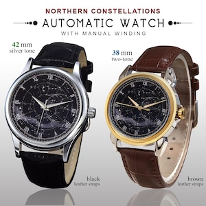 May include: Two automatic watches with manual winding. One has a 42 mm silver tone case and black leather straps. The other has a 38 mm two-tone case and brown leather straps. Both watches feature a dark dial with a constellation design.