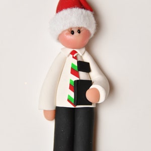 This LDS missionary is ready to serve. He is approximately 3 1/2 inches tall, made from polymer clay. Each ornament is sculpted by hand.