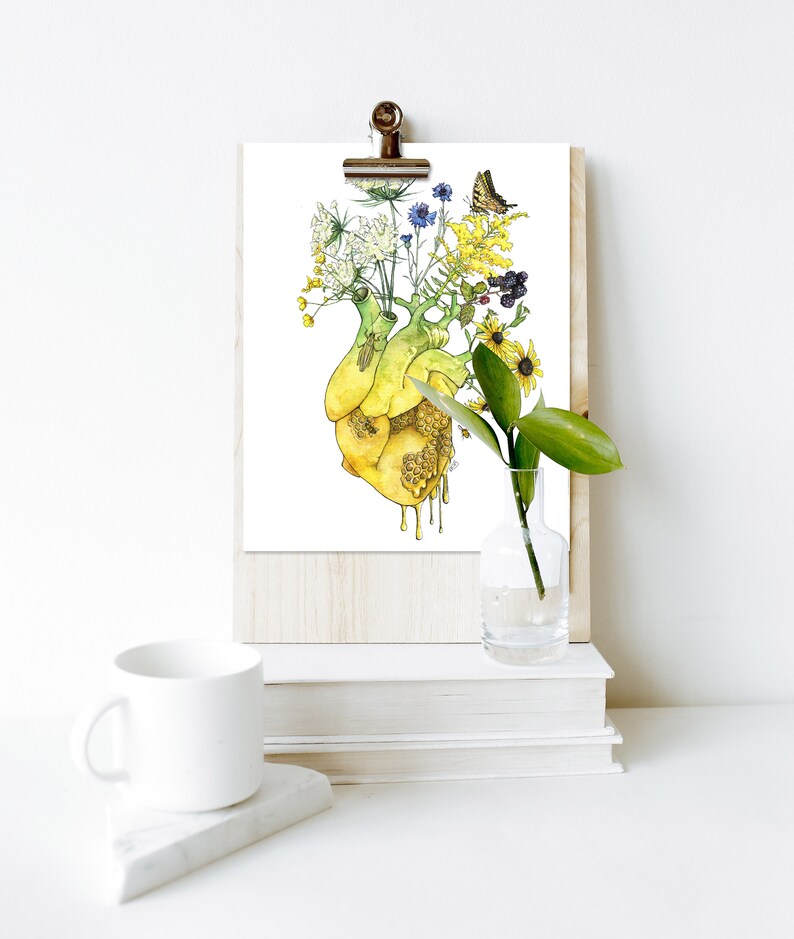 May include: A watercolor painting of a human heart with flowers growing out of it. The heart is dripping with honey. The flowers are yellow, white, blue, and purple. There is a butterfly on the flowers.