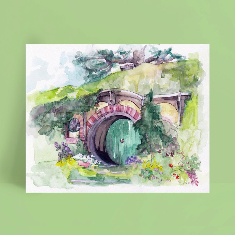 May include: A watercolor painting of a hobbit hole with a green door. The hole is surrounded by lush greenery and flowers.