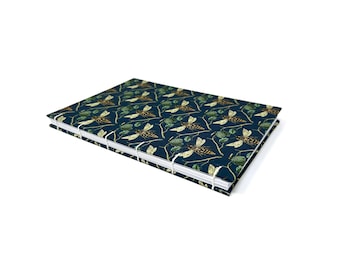 DOT GRID journal notebook. Lays flat with dot grid pages, plus a pocket. KARINA