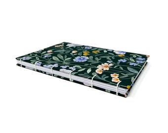 DOT GRID journal notebook. Lays flat with dot grid pages, plus a pocket. AMELIA