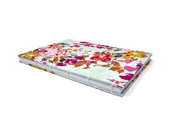 DOT GRID journal notebook. Lays flat with dot grid pages, plus a pocket. CASSIA