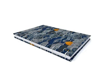 DOT GRID journal notebook. Lays flat with dot grid pages, plus a pocket. LULU