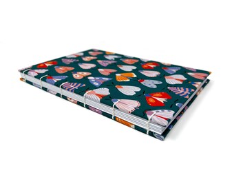 DOT GRID journal notebook. Lays flat with dot grid pages, plus a pocket. ALLORA