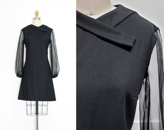Vestido mini estilo años 60/70, negro, transparente, de gasa, con mangas románticas y etéreas, estilo mod, minimalista, gótico o bruja. Tallas M o L.