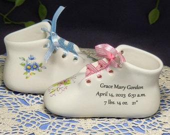 Personalized Porcelain Baby Shoe Includes Baby's full Birth Information.  Includes a message on the bottom of the shoe. Side Writing