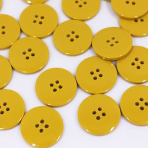 Oversized 2024 yellow buttons