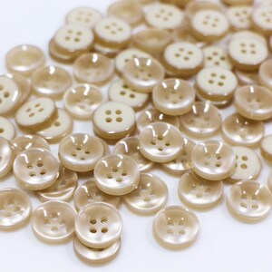 Botón marrón claro, en forma de cuenco, cuatro agujeros, forma redonda, borde elevado, acabado brillante, 11 mm, color beige, tamaño pequeño, estándar básico simple