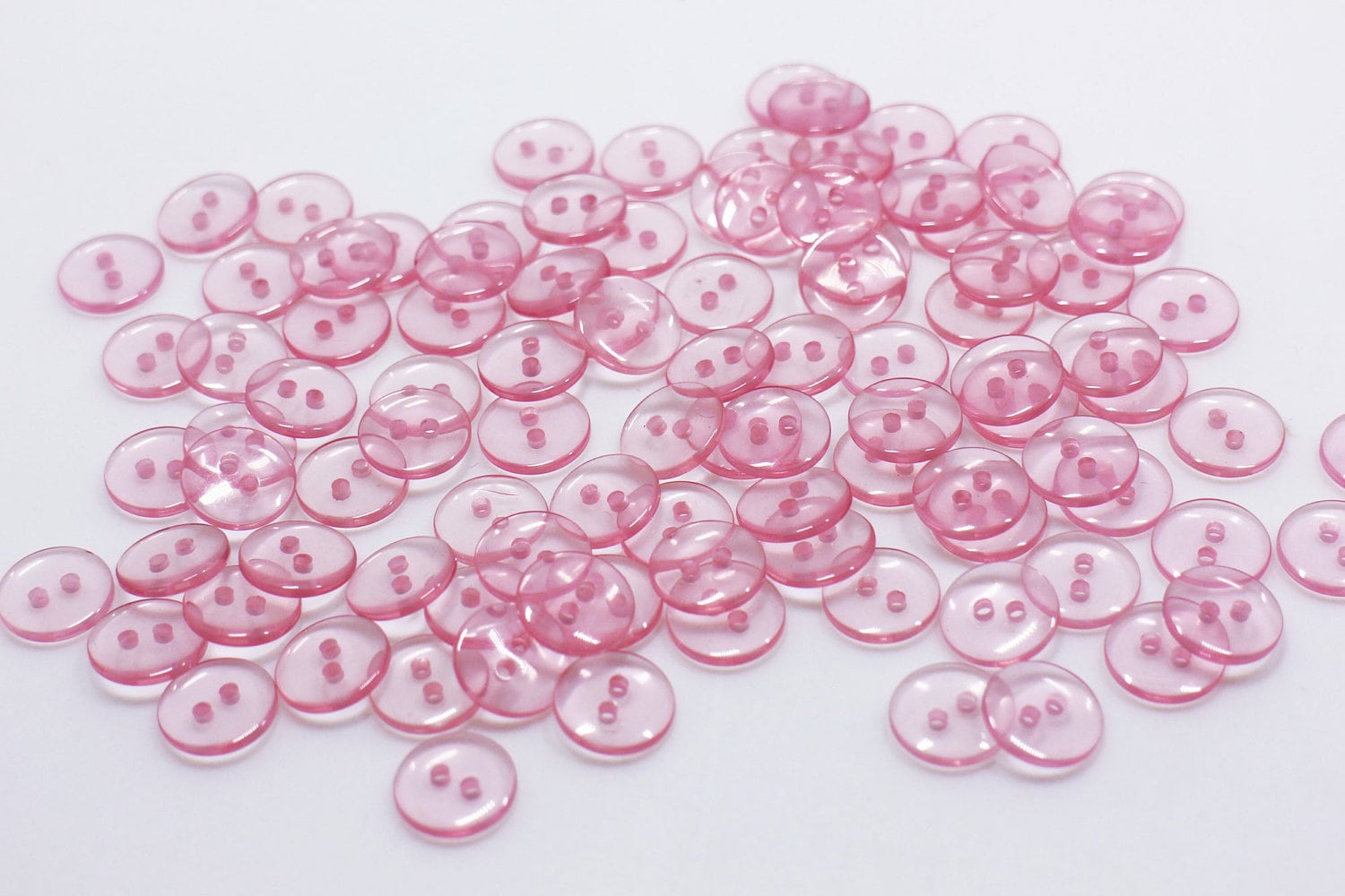 Bouton rond plastique recyclé 4 trous rose layette
