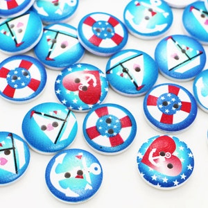 May include: A selection of round wooden buttons with nautical themes. The buttons display anchors, sailboats, life buoys, and hearts, in blue, red, and white. Each button has two or three holes for sewing, perfect for craft projects.