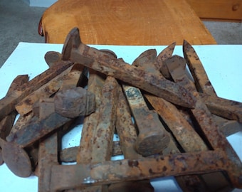 50 IRON RAILROAD SPIKES 49.95