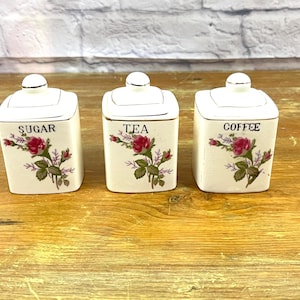 Vintage mini kitchen canister jars Rose themed Sugar Tea and Coffee Porcelain Canisters 3 1/2&quot; tall imperfect