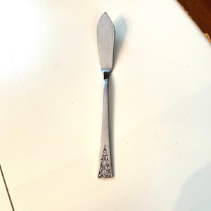 Vintage Orleans Stainless Butter Knife Triple Flower End