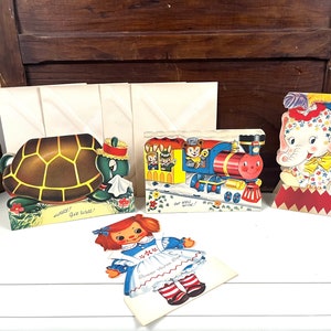 Tarjeta Vintage Children's Get Well Tarjeta de bienestar con temática animal con un mensaje dulce, la tarjeta se levanta sobre su propia muñeca de tren de elefante tortuga