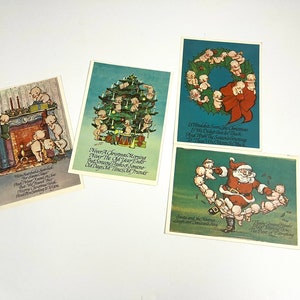 Set di cartoline natalizie inutilizzate vintage Kewpie di 4 bambole Kewpie con progetti artigianali di Babbo Natale Decorazioni natalizie vintage