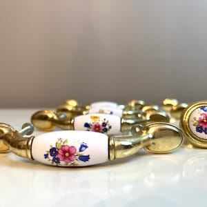 Vintage Gold Tone and Ceramic Painted Floral Drawer Pulls  lots of patina Sold Individually
